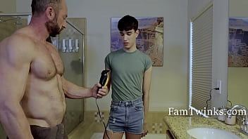 Stepson assists his father in grooming his genitals in a family setting